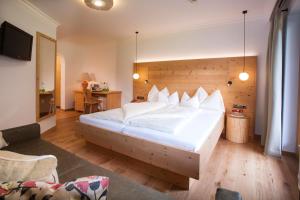 Posteľ alebo postele v izbe v ubytovaní Natur- & Wanderhotel Tuxertal