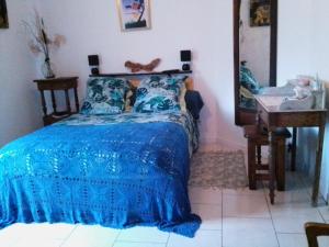 Postel nebo postele na pokoji v ubytování le Chausse à Brès chambre d'hôtes 1