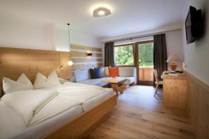 Posteľ alebo postele v izbe v ubytovaní Natur- & Wanderhotel Tuxertal
