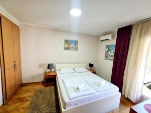 Krevet ili kreveti u jedinici u okviru objekta Apartments Pier