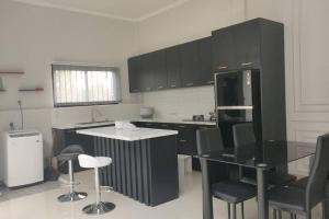 Villa galunggung rooftop Tasikmalaya的厨房或小厨房