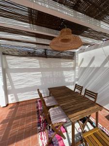 Khu vực ghế ngồi tại Casa Tropical - maison typique dans le centre historique d'Olhao