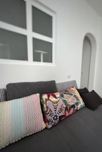 Khu vực ghế ngồi tại Casa Tropical - maison typique dans le centre historique d'Olhao