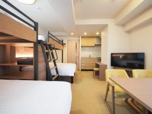 HIYORI Stay Kyoto Kamogawa客房内的一张或多张床位
