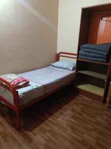Ein Bett oder Betten in einem Zimmer der Unterkunft Hostel el Amanecer