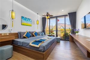 Postel nebo postele na pokoji v ubytování Hai Hội Villa Hoi An