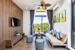TV a/nebo společenská místnost v ubytování Hai Hội Villa Hoi An