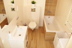 Koupelna v ubytování SMM Apartament Stettin