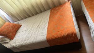 Letto o letti in una camera di Hotel Bogota Astral