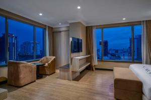 TV a/nebo společenská místnost v ubytování Caravan Hotel by EHM