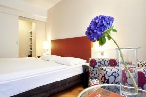 Katil atau katil-katil dalam bilik di Singerstrasse 21-25 Aparthotel 350m next to St Stephen's Square +26 gambar