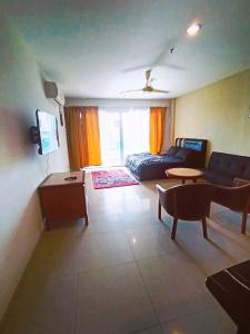 Χώρος καθιστικού στο Marina HOMESTAY JETI LUMUT MANJUNG