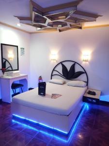 Postel nebo postele na pokoji v ubytování Halina Drive in Hotel-Sta Mesa