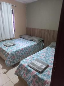 Postel nebo postele na pokoji v ubytování Br 040, perto de Luziânia e Valparaiso, Casa 5