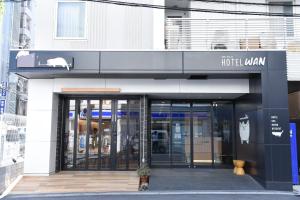 a hotel waaan building with its doors open at HOTEL WAN OSAKA EBISU in Osaka