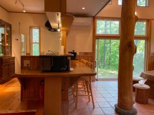 Kuchyň nebo kuchyňský kout v ubytování Mimos Cottage