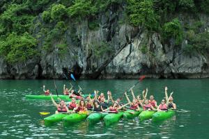 a group of people on a raft in the water at Halong Luxury Cruise in Ha Long