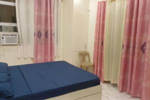 Postel nebo postele na pokoji v ubytování Guiuan Bayview