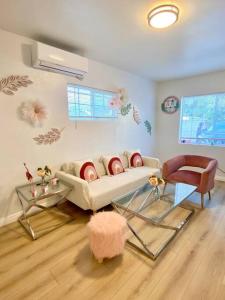 a living room with a couch and a chair at Pink Cozy house 2 bedrooms in Rosemead