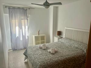 Giường trong phòng chung tại Horizonte azul