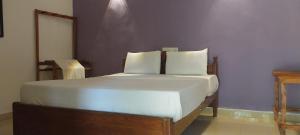 Letto o letti in una camera di Hotel Samanala Sigiriya