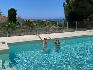 Bazén v ubytování Corsicadream Arone superbe appartement dans villa, vue panoramique mer, piscine, proche Porticcio nebo v jeho okolí
