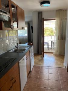 Køkken eller tekøkken på Apartmani Bianca