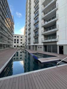 a swimming pool in the middle of a building at The Icon Capetown in Cape Town