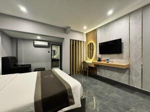 TV a/nebo společenská místnost v ubytování LION 9 HOTEL