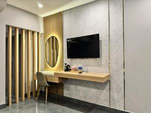 TV a/nebo společenská místnost v ubytování LION 9 HOTEL