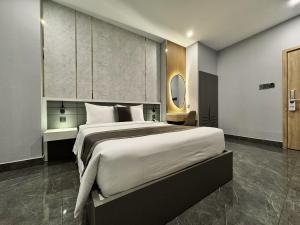 Postel nebo postele na pokoji v ubytování LION 9 HOTEL