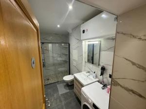 Koupelna v ubytování L'étoile de Seine 77 Appartement 3 + 9 fotografií
