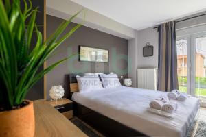 Кровать или кровати в номере Seaside Apartment
