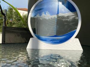 a blue and white vase sitting on top of a table at Summer Home in Potos