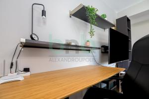 Кухня или мини-кухня в Seaside Apartment
