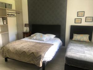 Postel nebo postele na pokoji v ubytování Chambre d'Hôtes Les Bacquerins + 33 fotografií