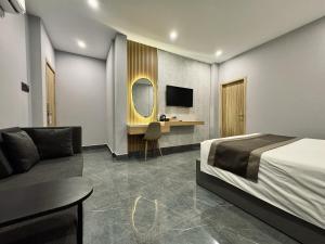 TV a/nebo společenská místnost v ubytování LION 9 HOTEL