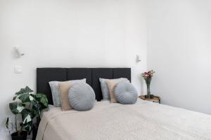 Posteľ alebo postele v izbe v ubytovaní Espresso Apartment Plac Mirowski