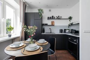 Kuchyňa alebo kuchynka v ubytovaní Espresso Apartment Plac Mirowski