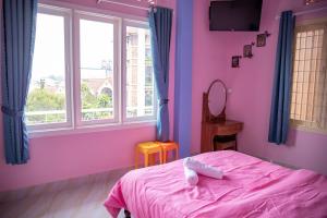 Rúm í herbergi á Bảo Dung Hotel