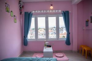 Rúm í herbergi á Bảo Dung Hotel