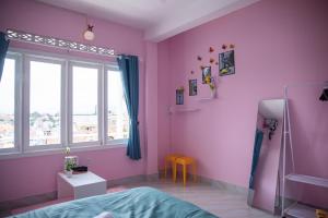 Rúm í herbergi á Bảo Dung Hotel