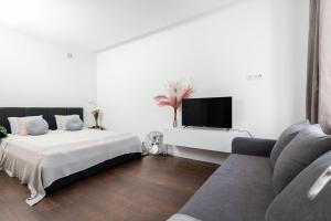Posteľ alebo postele v izbe v ubytovaní Espresso Apartment Plac Mirowski + 18 fotografií