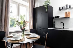 Kuchyňa alebo kuchynka v ubytovaní Espresso Apartment Plac Mirowski