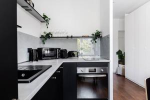 Kuchyňa alebo kuchynka v ubytovaní Espresso Apartment Plac Mirowski