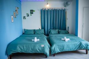 Rúm í herbergi á Bảo Dung Hotel