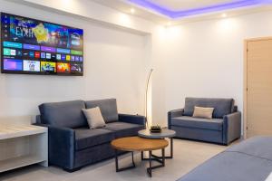 Televízia a/alebo spoločenská miestnosť v ubytovaní Azul Eco Hotel