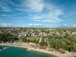 an aerial view of a town next to a body of water at Apartments Ineta in Sveti Filip i Jakov