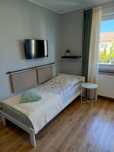 Postel nebo postele na pokoji v ubytování Jedrula