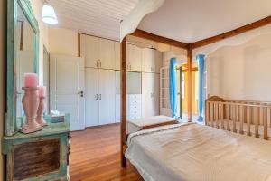 Postel nebo postele na pokoji v ubytování Blue apartment Corfu